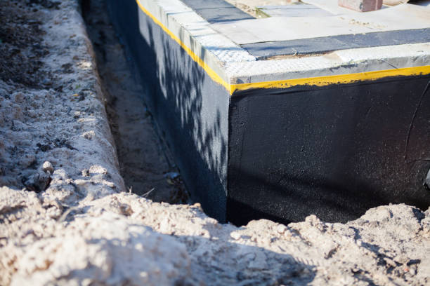 Professional Exterior Waterproofing technician working in Holley, NY